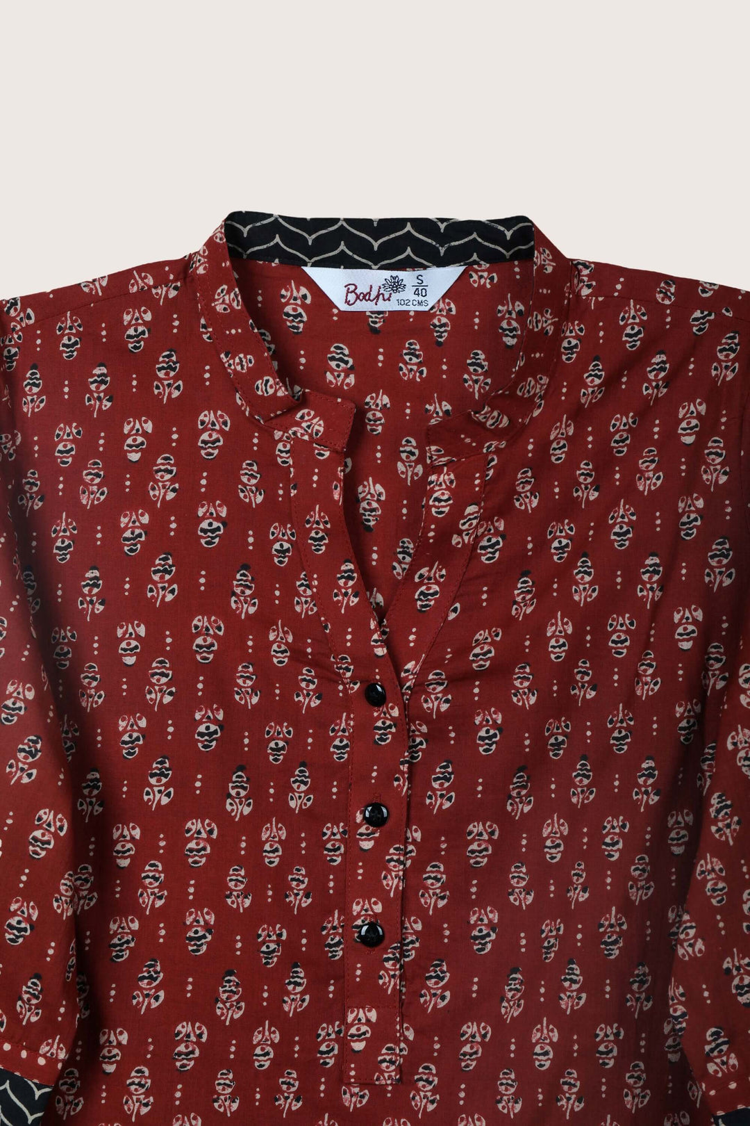 Verse red short kurti flat lay collar detail