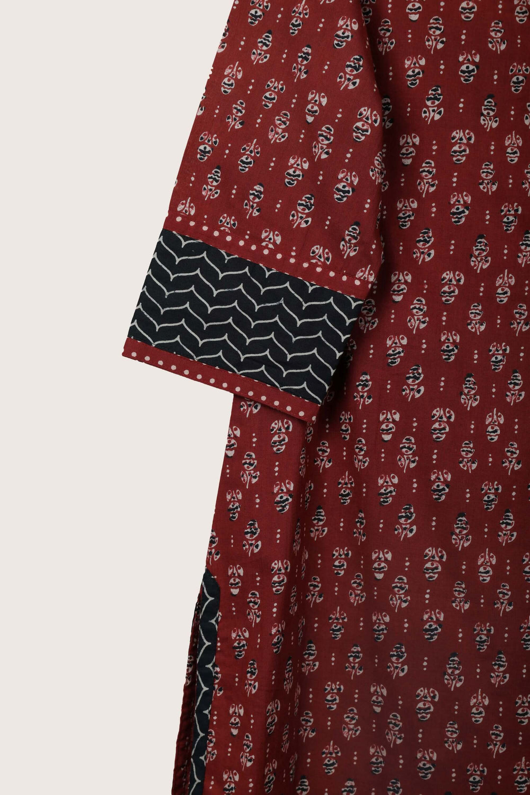 Verse red short kurti flat lay sleeve detail
